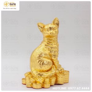 Tượng mèo ôm kim nguyên bảo thếp vàng 9999